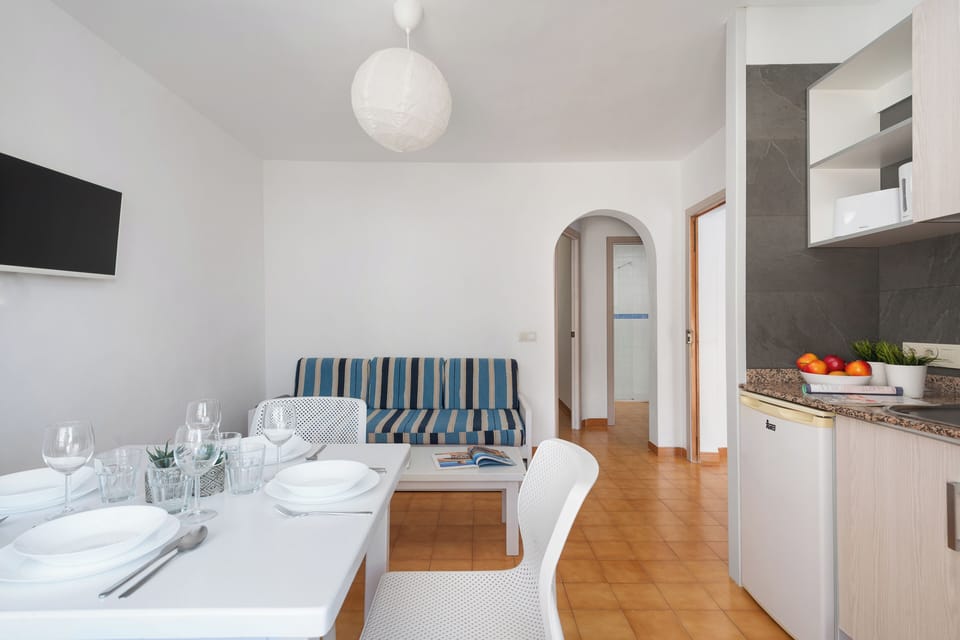 Standard Apartment, 1 Bedroom, Pool View | Living area | Flat-screen TV