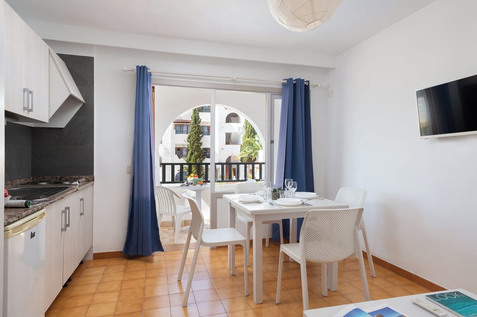 Standard Apartment, 1 Bedroom, Pool View | Living area | Flat-screen TV