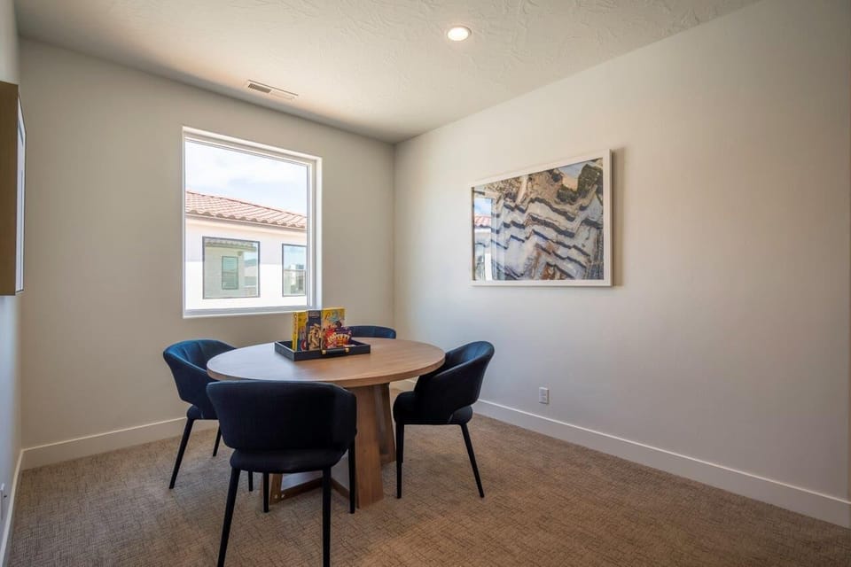 Additional seating at the game table in the upstairs family room