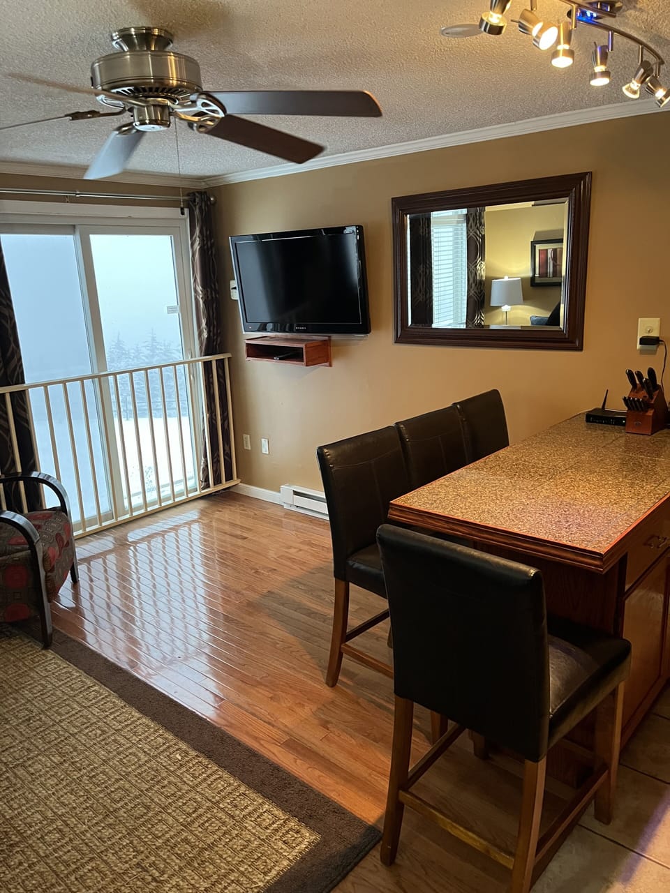 Cable TV and seating for 4 at the island.