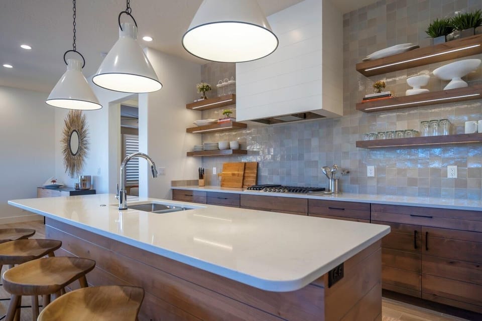 Kitchen is stocked with appliances and utensils for cooking