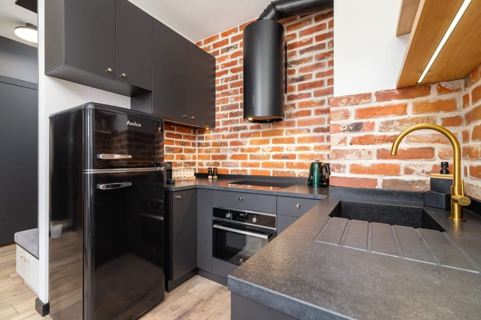 The fully equipped kitchenette includes everything you need for a home-cooked meal.