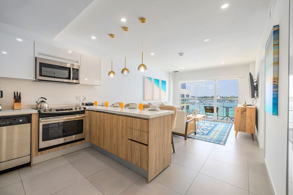 Your in-unit washer and dryer tuck neatly into a closet, making it effortless to refresh your wardrobe or beach towels anytime during your stay.