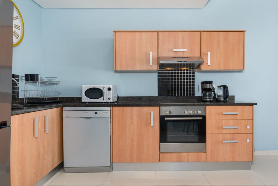 Comfort Apartment | Private kitchen | Fridge, microwave, oven, stovetop