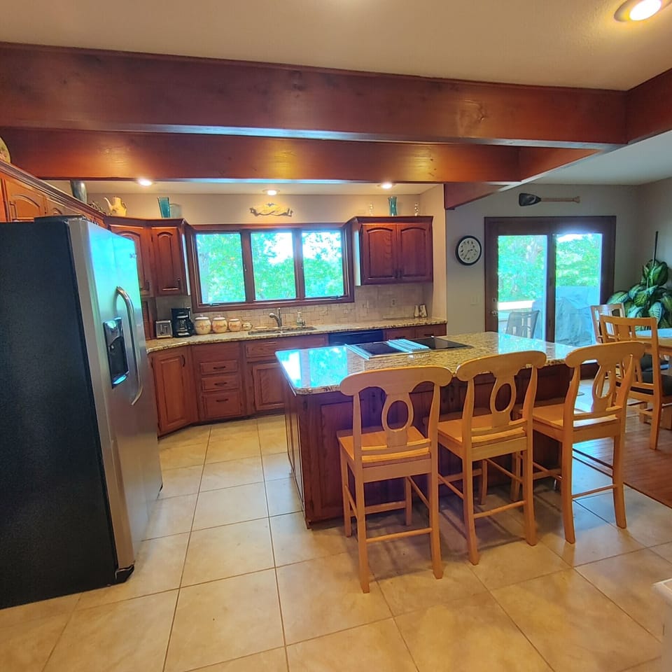 Updated kitchen with dishwasher, microwave and plenty of dish and cookware  

