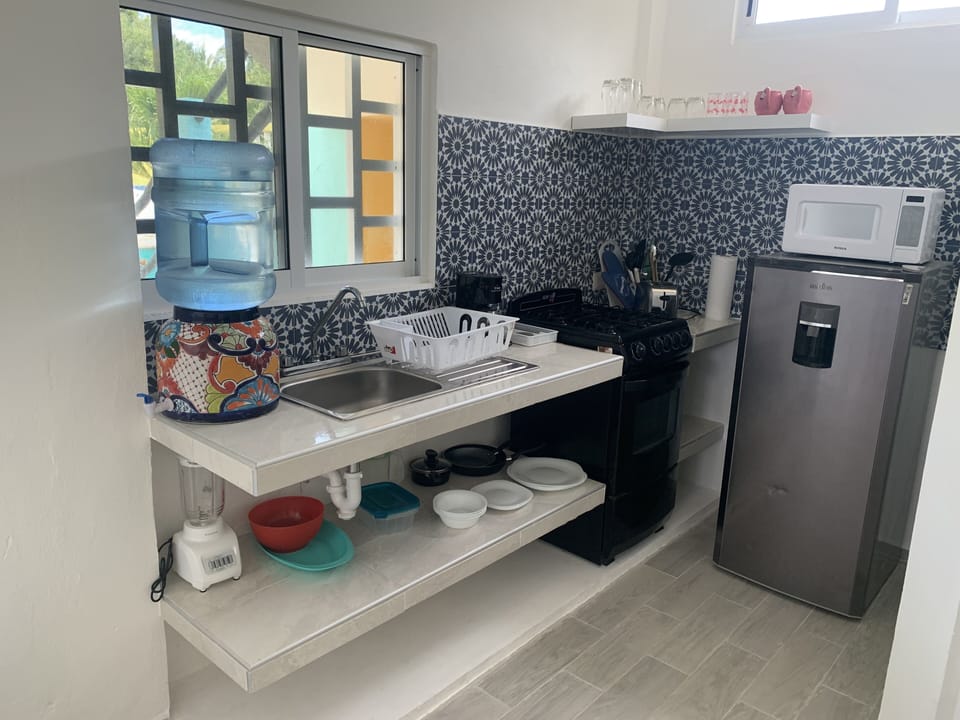 Superior Apartment | Private kitchen | Full-size fridge, microwave, stovetop, toaster