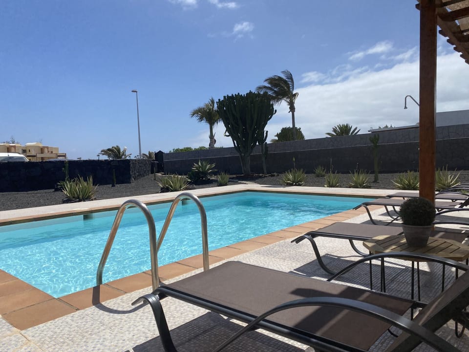 Tan on the loungers or enjoy the shade on a terrace designed for total relaxation.