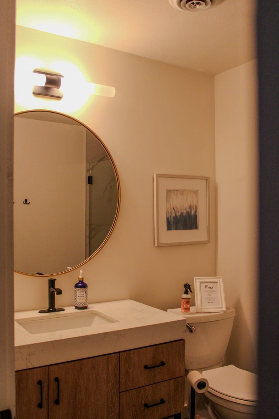 Full size lower level bathroom with walk in tile shower.