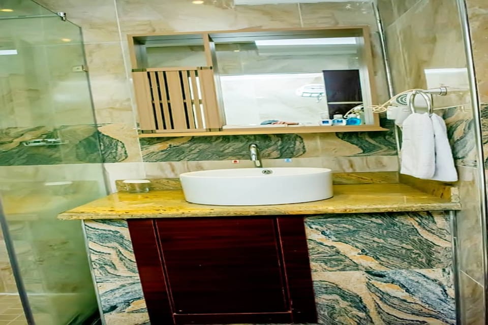 Deep soaking tub, rainfall showerhead, free toiletries, hair dryer