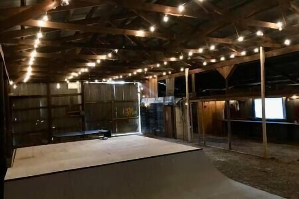 Here's a shot of the interior of the barn. It has a half-pipe, stage, and ping pong table.