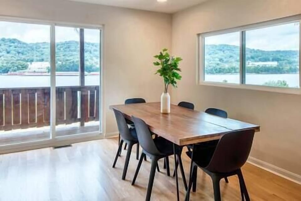 Enjoy a meal while taking in the river views! There's an extra folding table and 8 chairs.
