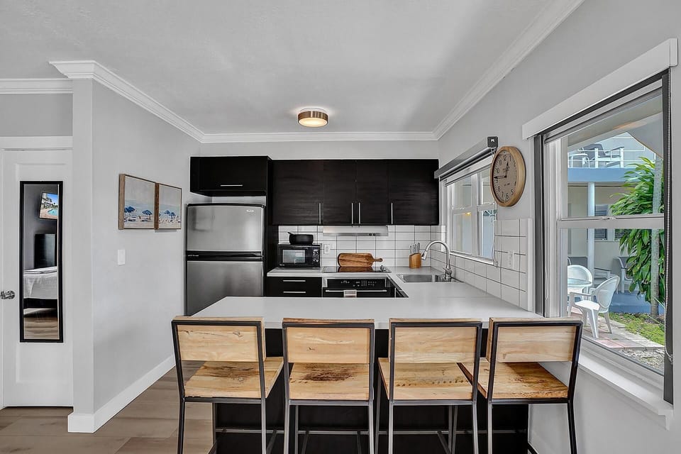 Well stocked kitchen and indoor dining.