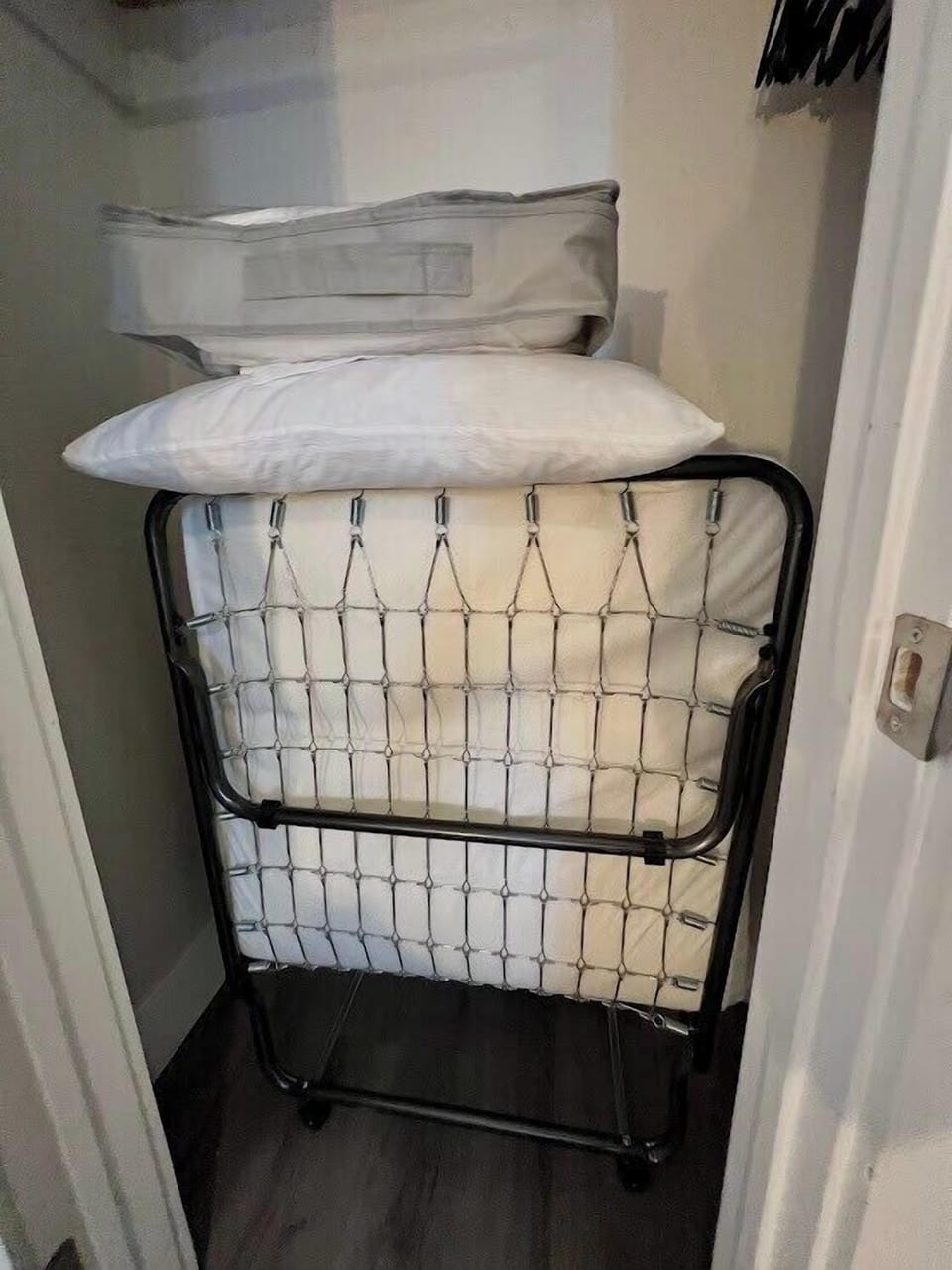 Foldaway bed  in the closet provides extra sleeping arrangement.