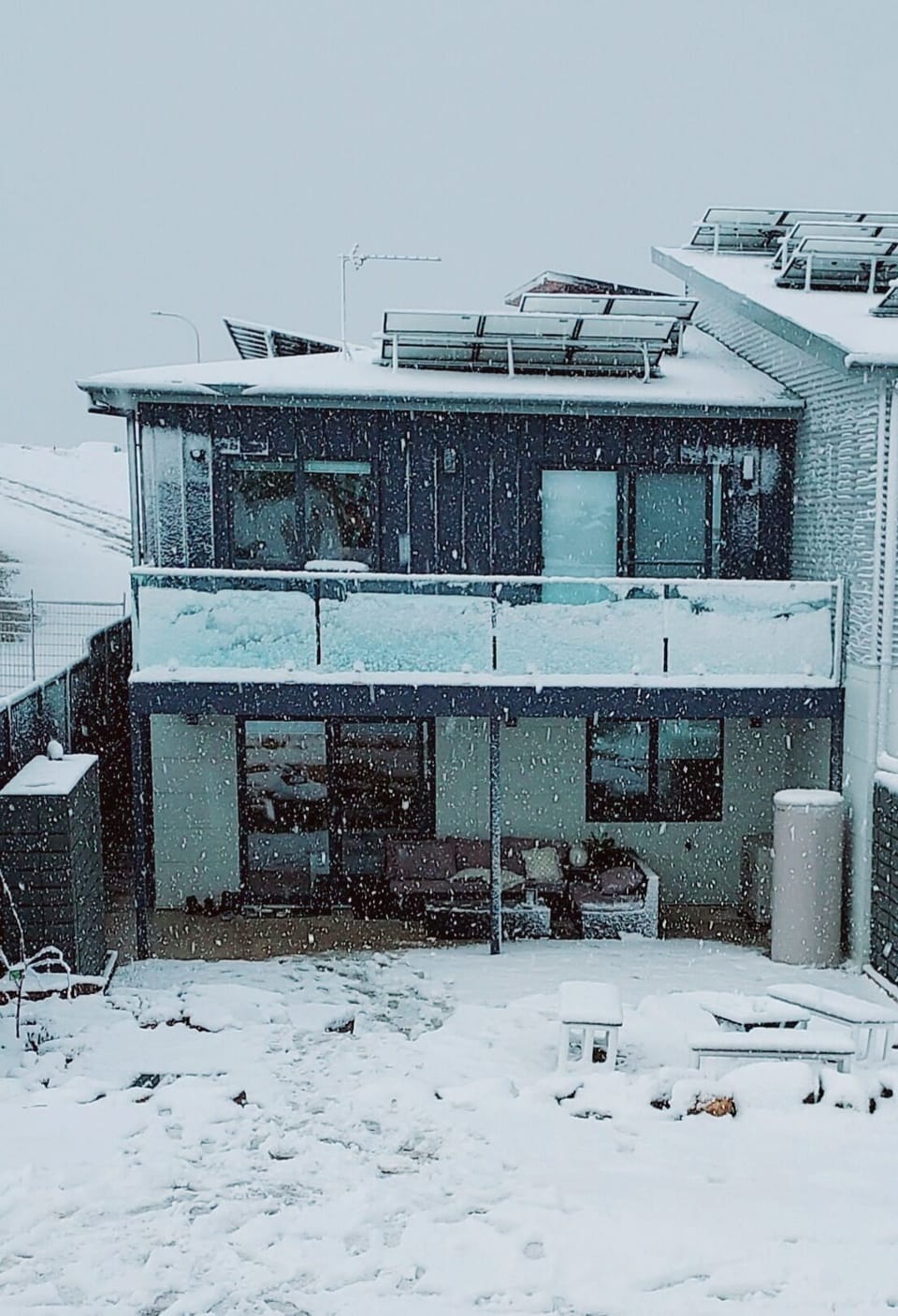 Snow falling at chalet