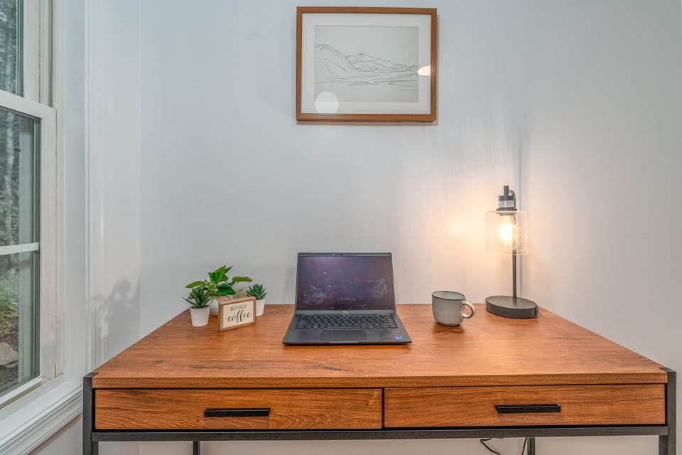 Guestroom 1 dedicated workstation with power strip, laptop not included :)
