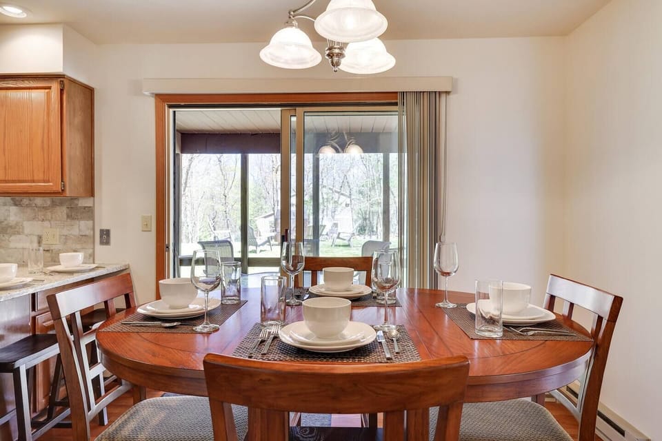 This area can easily sit 11 people (4 outside on the screened porch when the weather is nice).