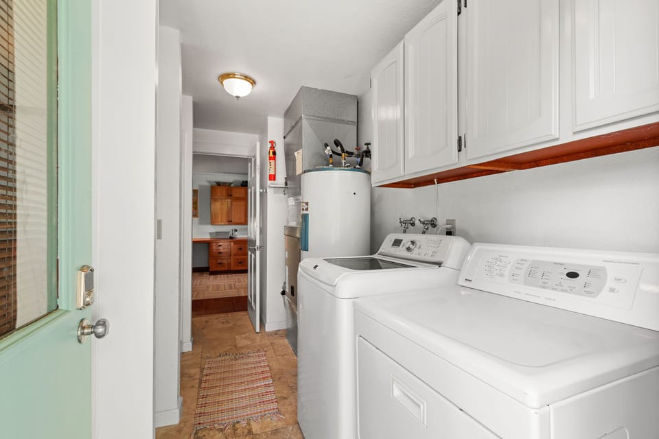 Laundry and 3/4 bath share this space