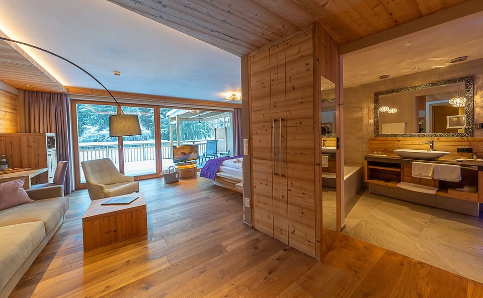 Junior Suite, Lake View, Lakeside | Minibar, in-room safe, desk, soundproofing