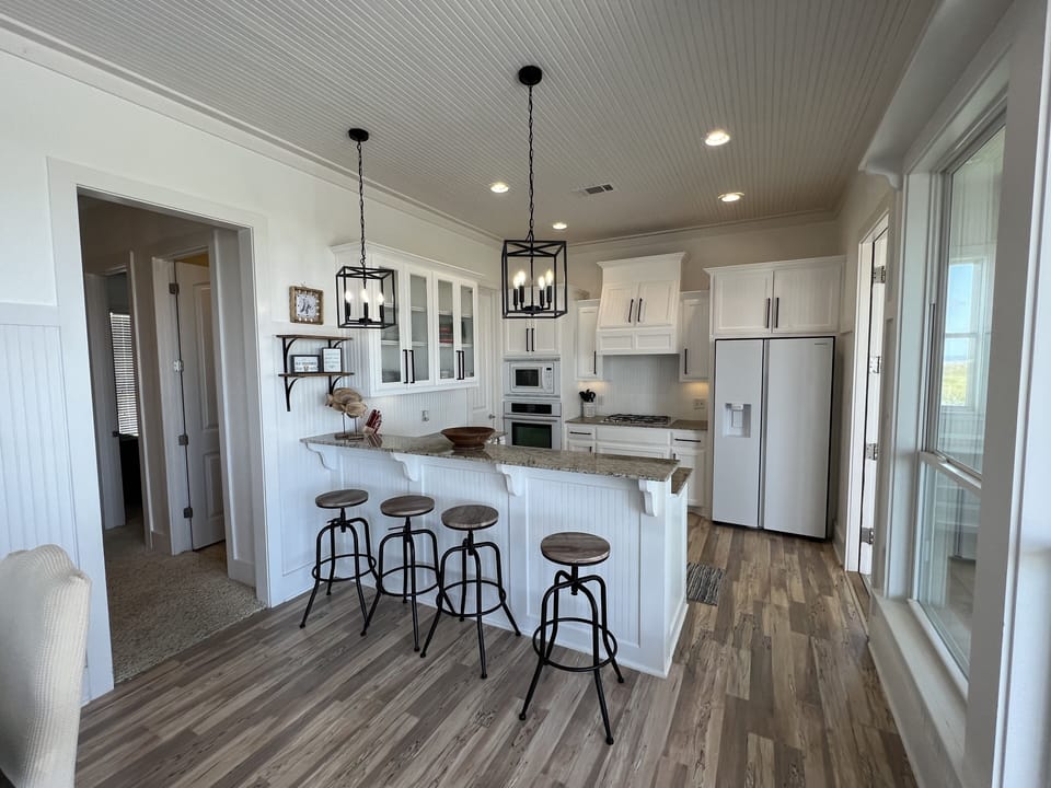 Kitchen opens to dinning room and living room 