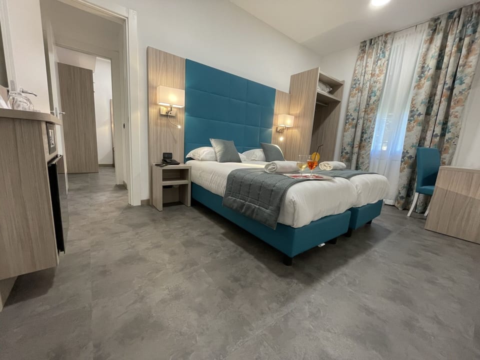 Family Room, Connecting Rooms | Desk, free WiFi, bed sheets