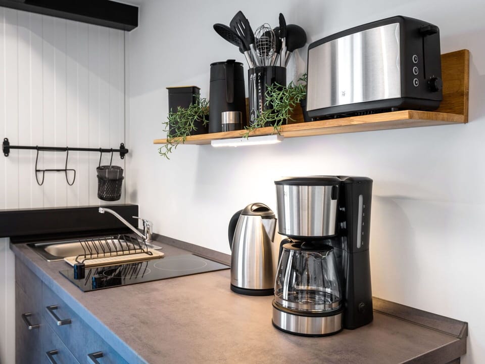 Property, Countertop, Tableware, Kitchen Appliance, Kitchen, Plant, Product, Cabinetry, Kitchen Stove, Interior Design