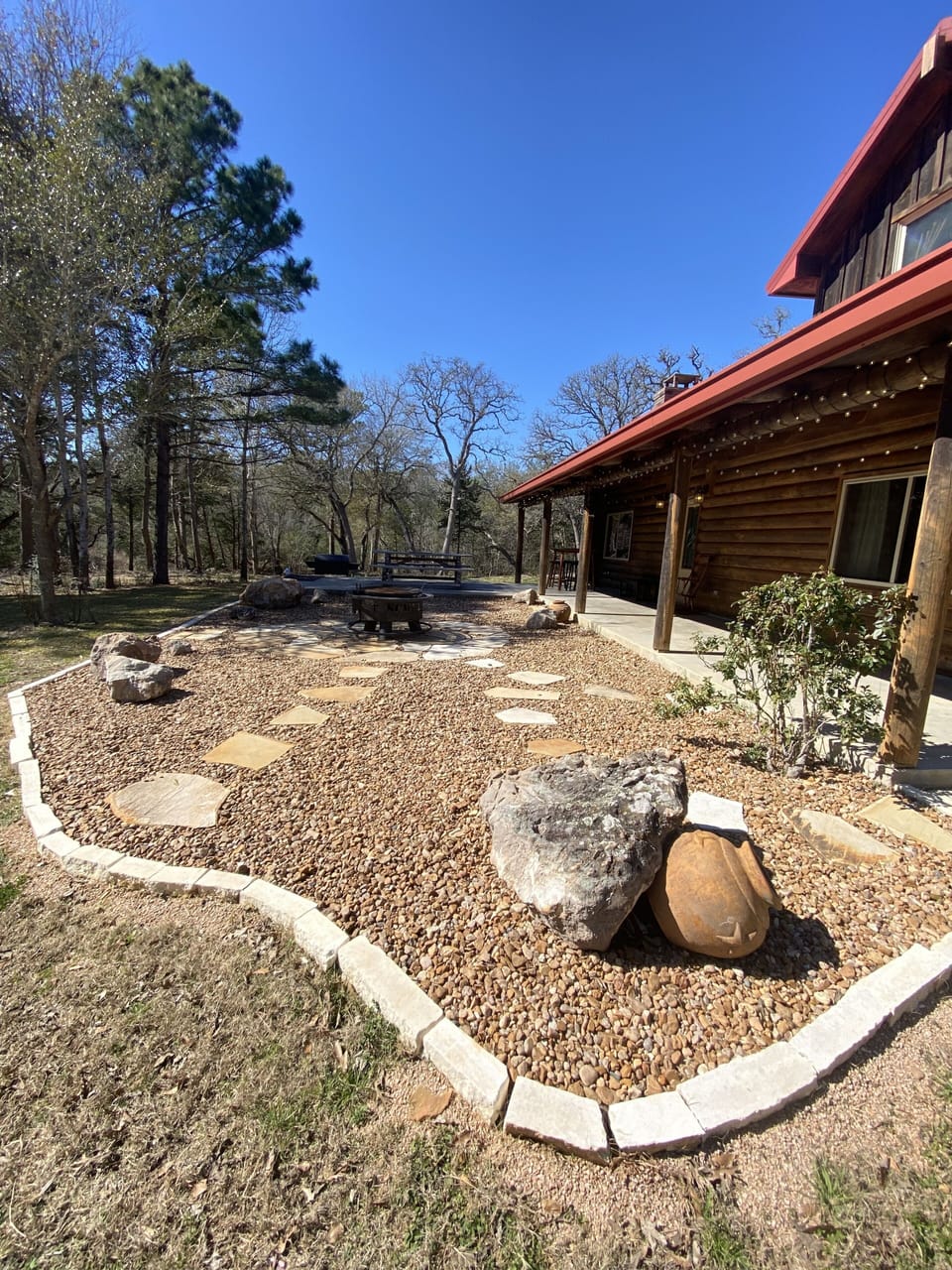 Log Cabin on 5 acres with access to a shared lake. 