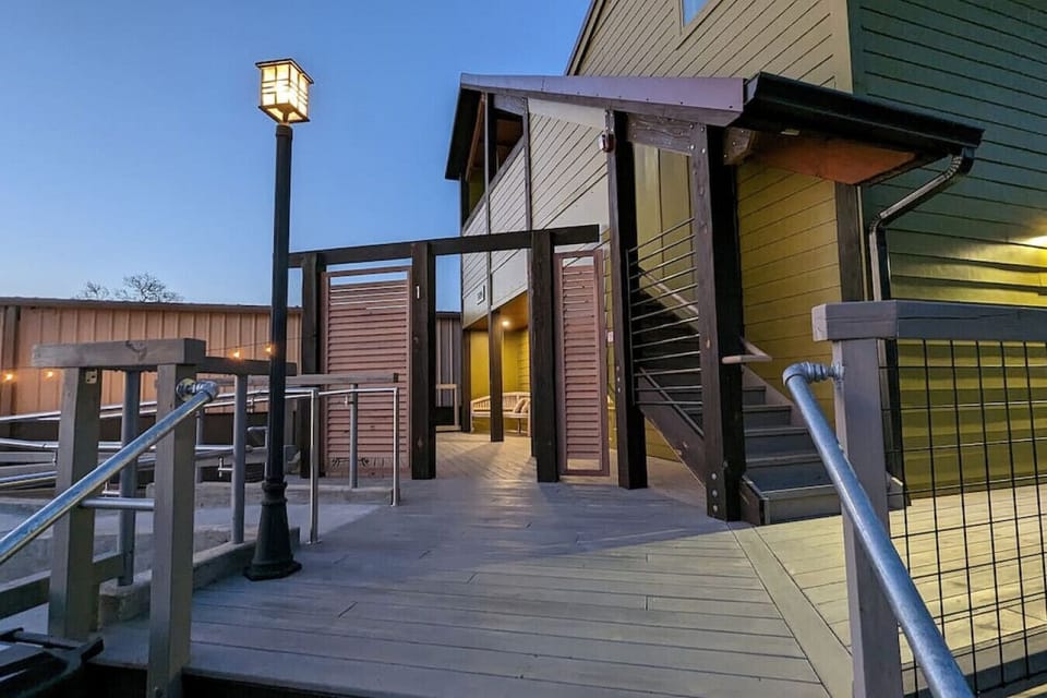 Shared space in front of Suite #1's Private Deck. Suites 1, 3 & 4 are Visitable — allowing you to have clients visit the front office area of your private Suite — with an accessible restroom in each Suite. #2, upstairs is not wheelchair accessible.