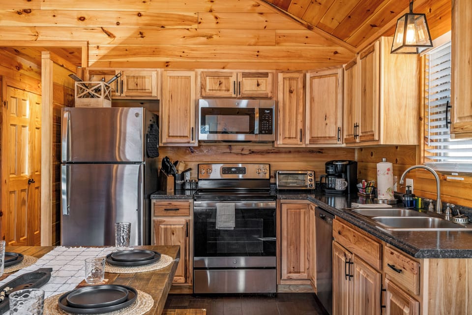 Modern Kitchen – A fully stocked kitchen with rustic wood finishes 