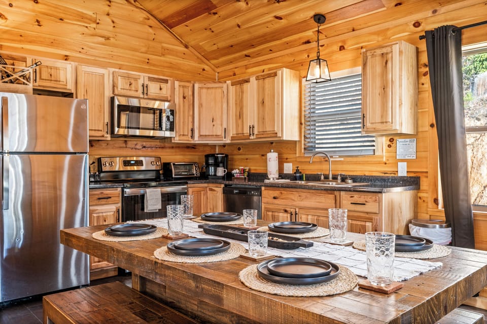 Modern Kitchen – A fully stocked kitchen with rustic wood finishes 