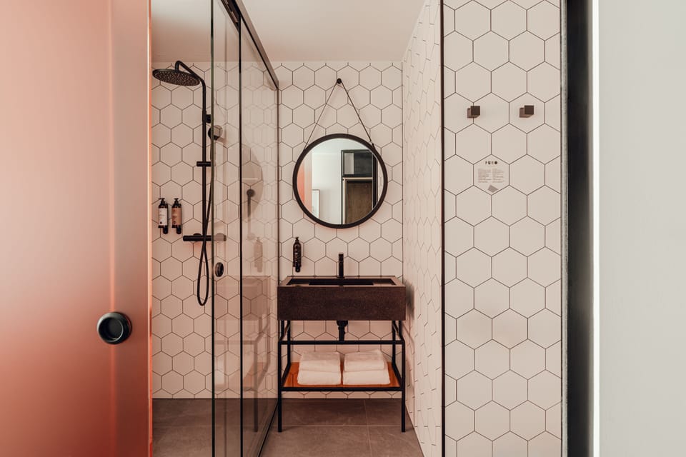 Shower, rainfall showerhead, eco-friendly toiletries, hair dryer