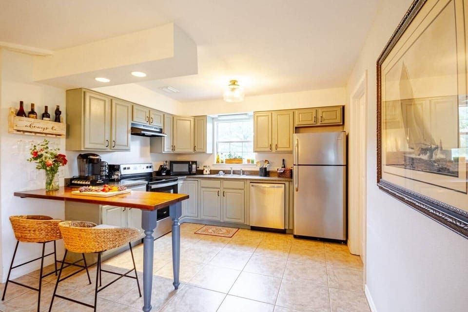 Fully equipped kitchen with coffee bar, Keurig, drip coffee maker, espresso machine, French press,  kettle and pour over options.  Modern appliances, spices, and everything you need to cook and dine at home.