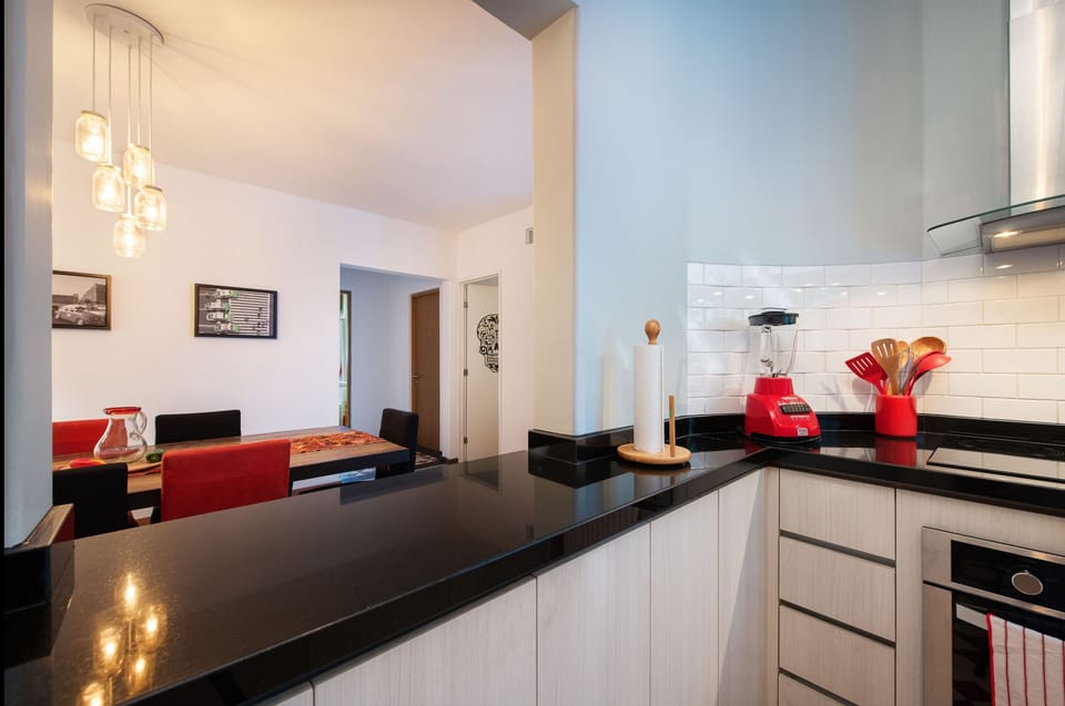 Apartment, 2 Bedrooms | Private kitchen | Coffee/tea maker, electric kettle, dining tables