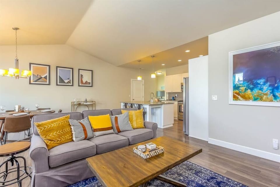 Cozy living space with plenty of seating, and gorgeous natural light.