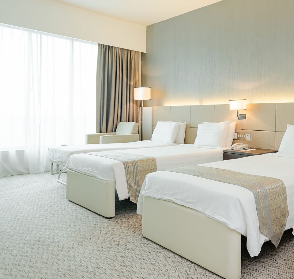 Deluxe Quad | In-room safe, desk, soundproofing, iron/ironing board