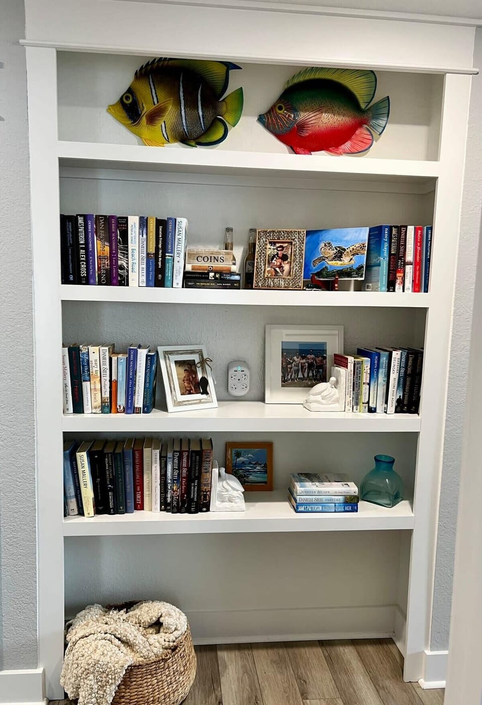 Thoughtfully stocked bookshelf for relaxing evenings.
