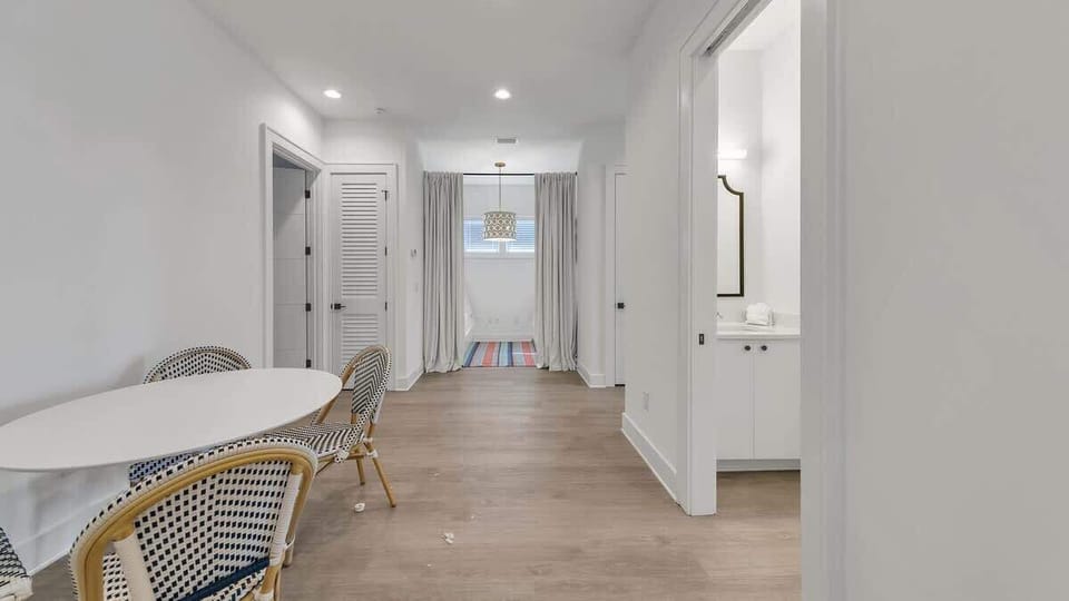 Second floor sitting area, bunk room and shared bathroom 