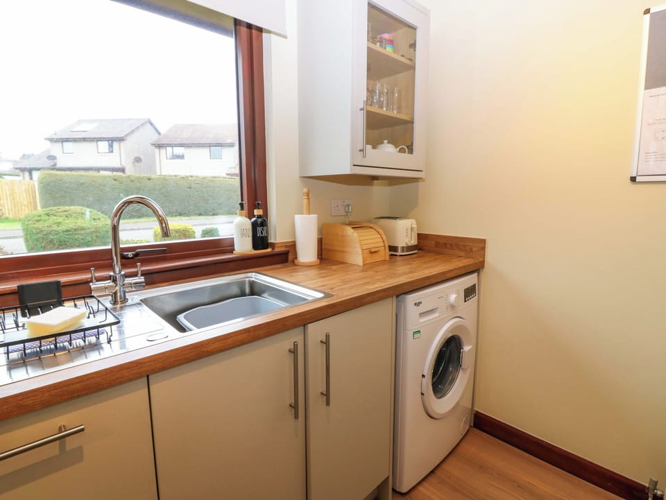 Fridge, electric kettle, toaster, cookware/dishes/utensils