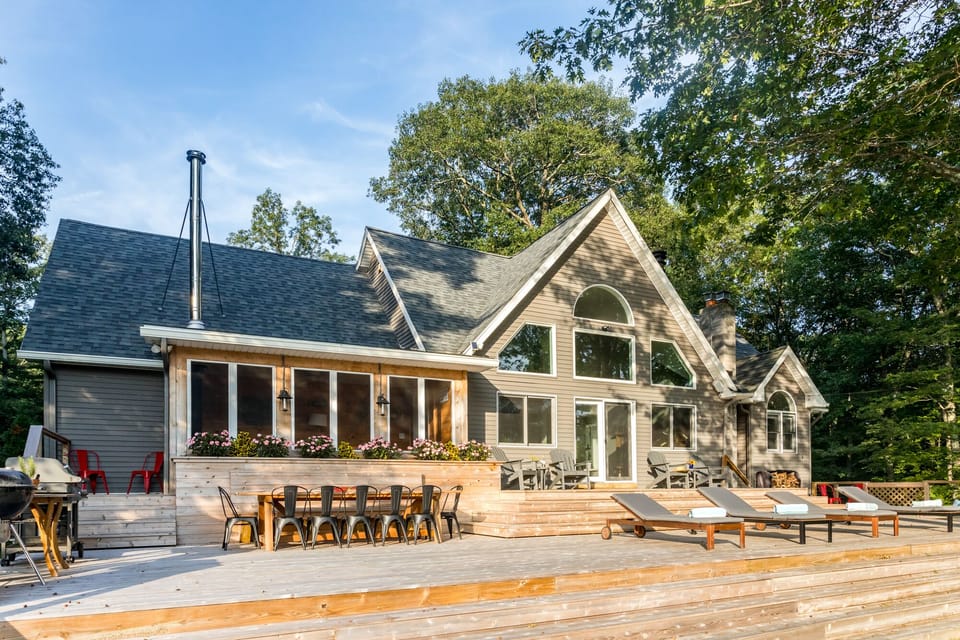 1,800 sq ft deck, dining table (seats 12), gas and charcoal grill