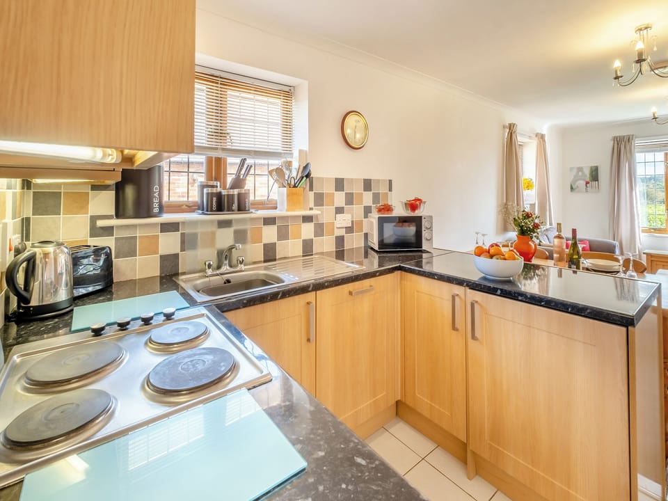 Kitchen area | Hill Top Cottage - Fair Isle Holiday Cottages, Near Newport