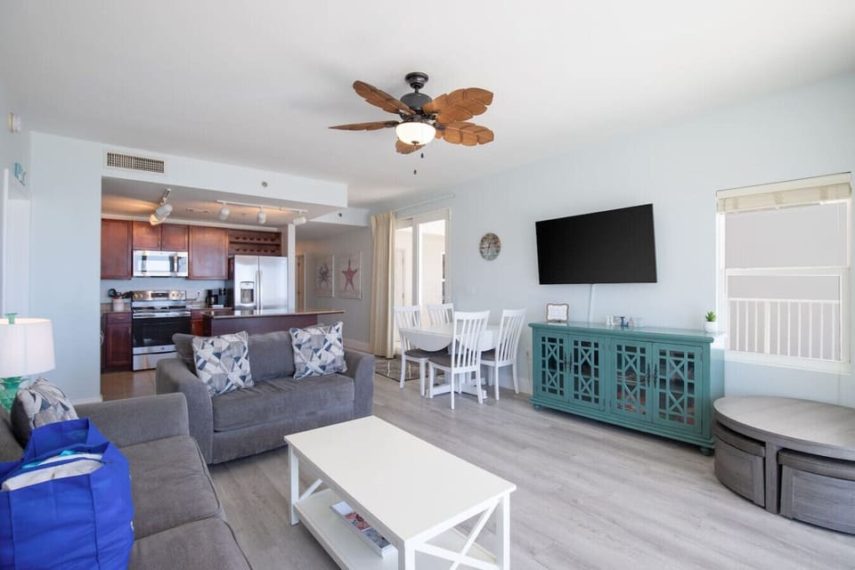 Ocean View Living Area with Flat Screen TV, Sleeper Sofa and Private Balcony Access