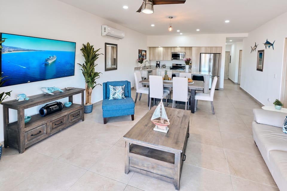 65" Samsung smart tv and open concept layout makes you feel at home