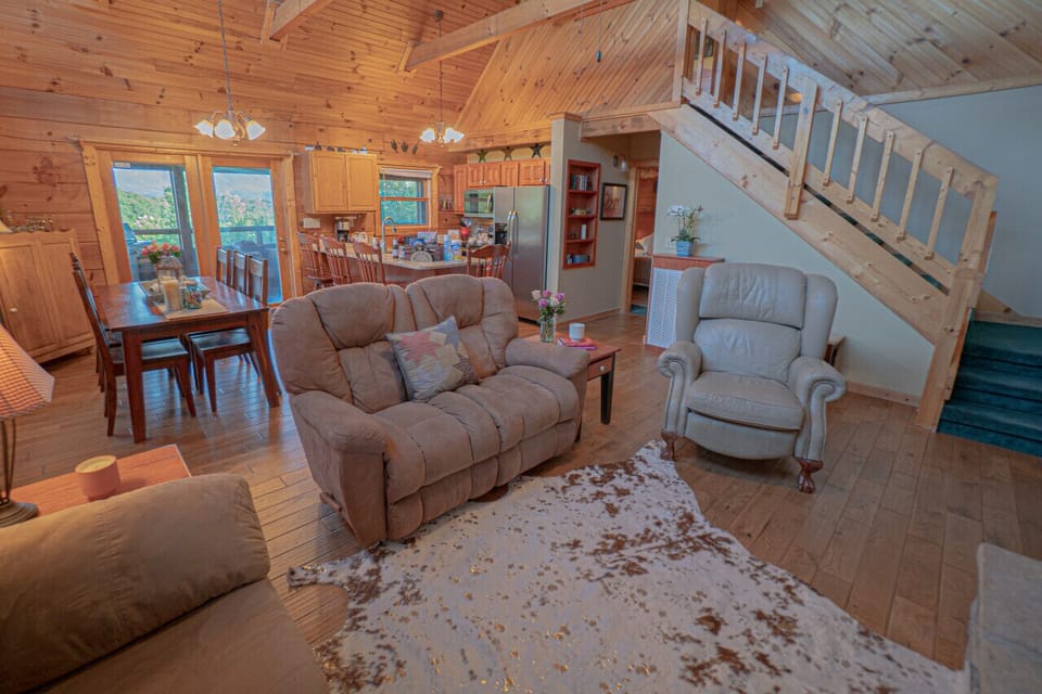 Main Floor Living Room, Dining and Kitchen. Living Room has Wood Burning Fireplace. Open Floor Plan