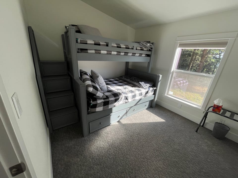Bunk-bed, bedroom 2. Twin on top, full on bottom. Has stairs, not ladder. 