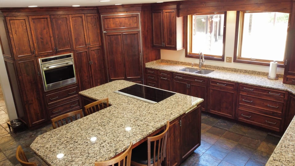 Bosch cooktop on the island- Built in Wolf oven and second Wolf steam oven