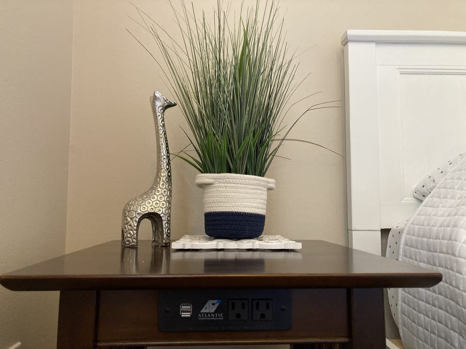 Second bedroom nightstands both have a built in charging station!