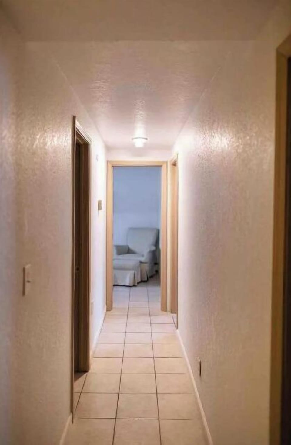 Hallway view from bottom of stairs to Moose and Evergreen Rooms