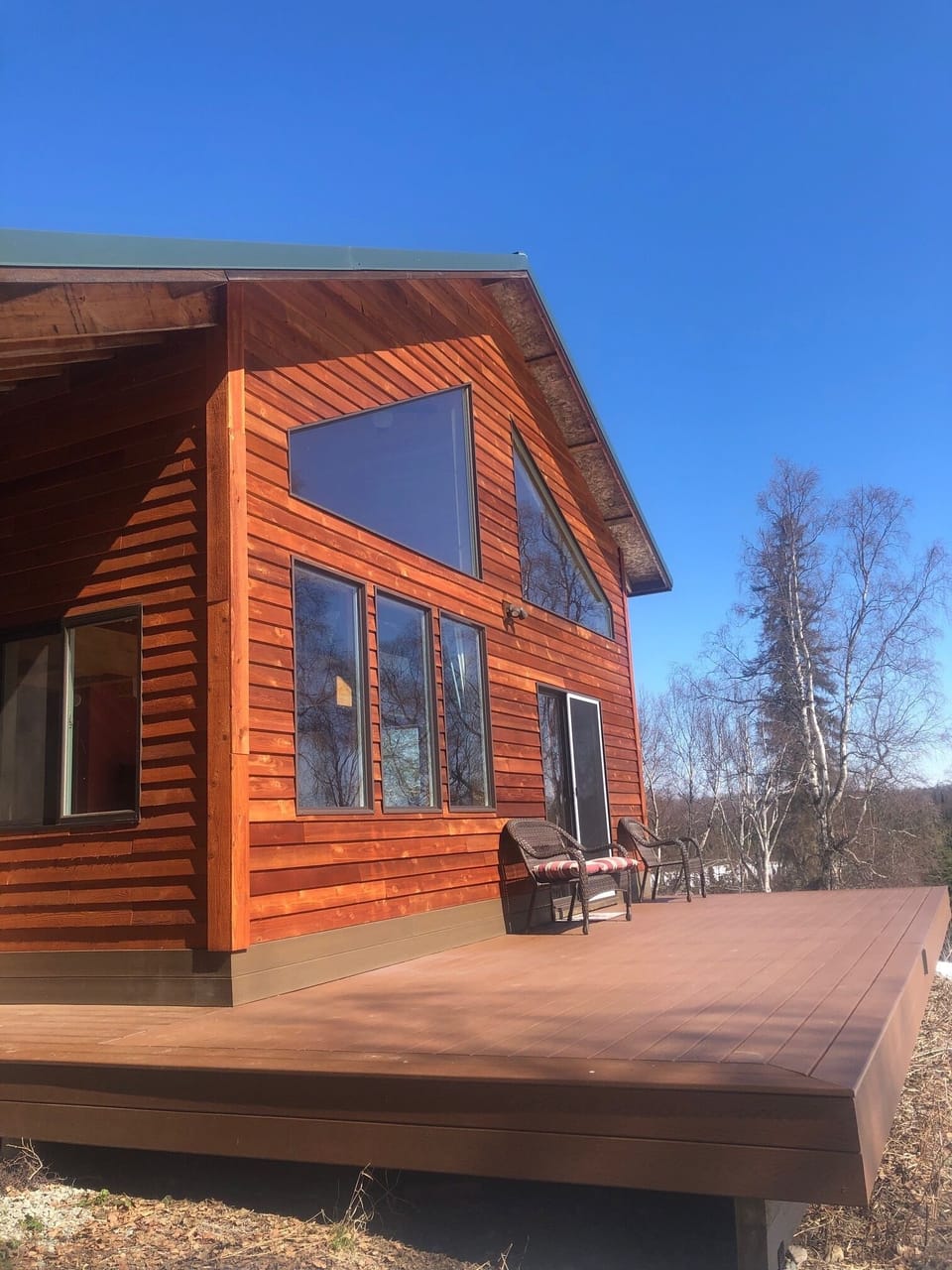 A spacious deck and large windows maximize the tranquil views.