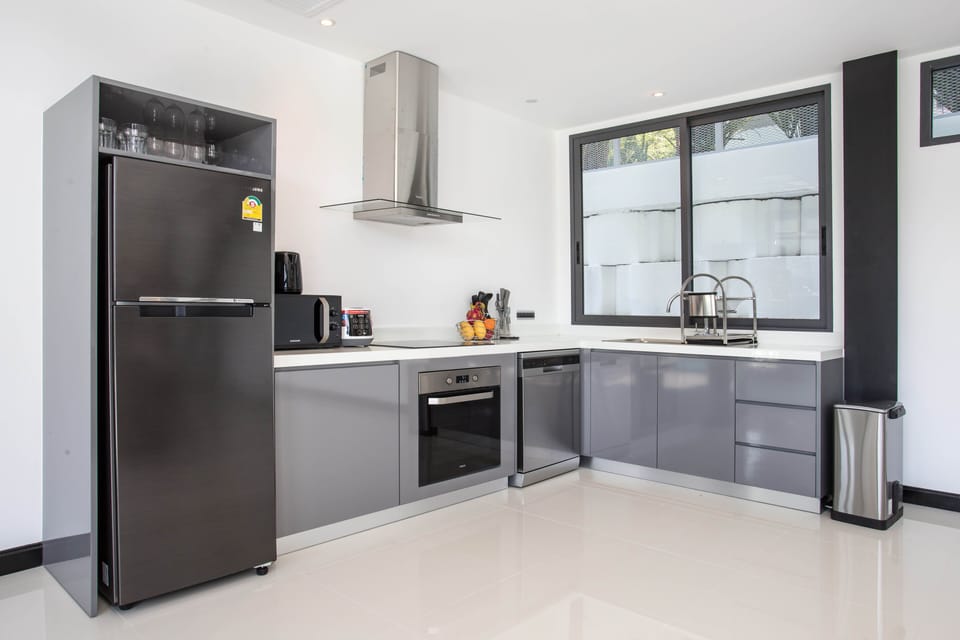Luxury Villa | Private kitchen | Fridge, microwave, stovetop, dishwasher
