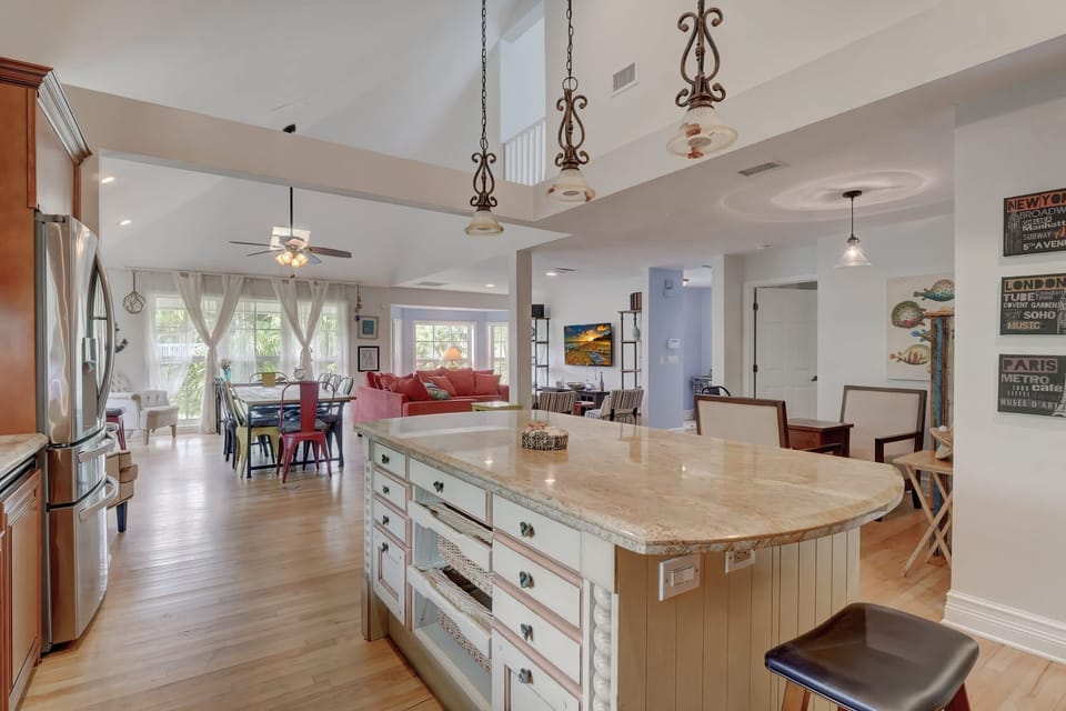 There is a Large Island In the Center of the Kitchen