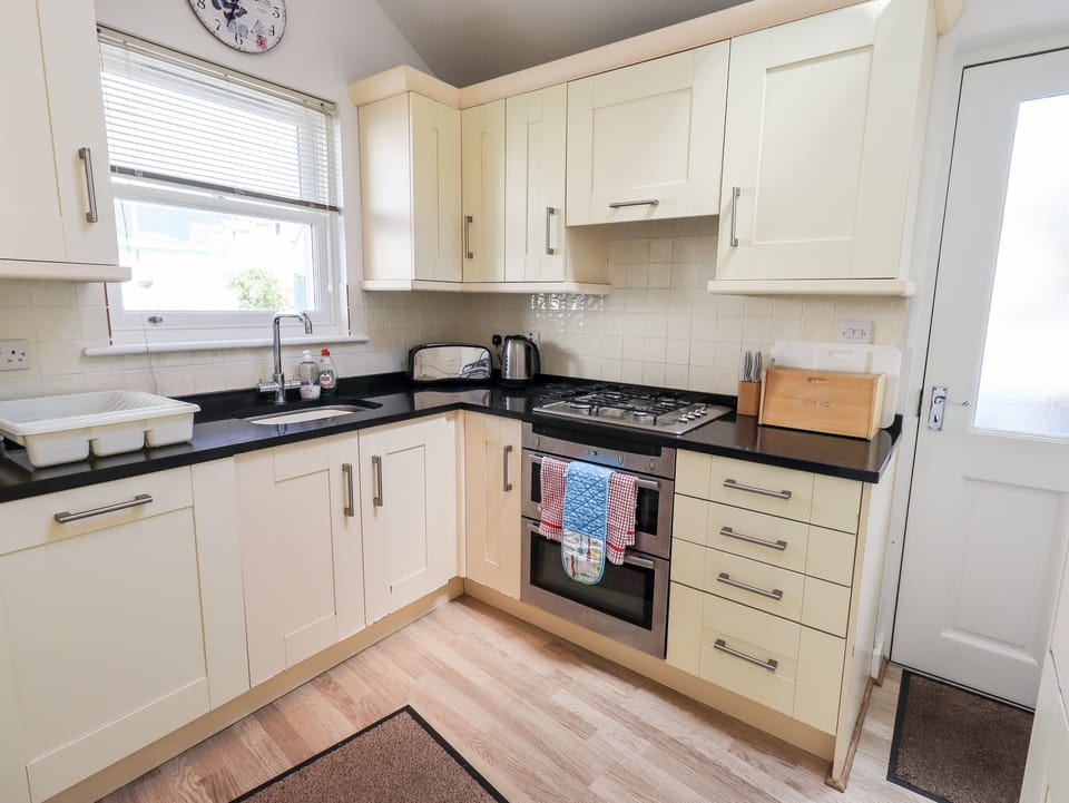 Fridge, dishwasher, electric kettle, toaster